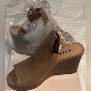New never worn Taupe Scandal. Size 8.5. Does have small stains on one shoe.